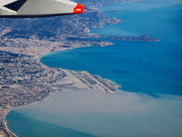 A great view of the airport, the city of Nice and moving up Saint-Jean-Cap-Ferrat, Monaco tucked in behind a hill and Menton