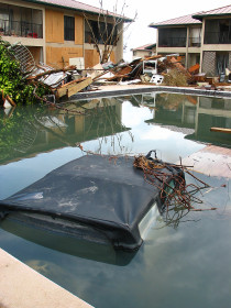 Grand Cayman - Notice the car roof sticking up from the swimming pool
